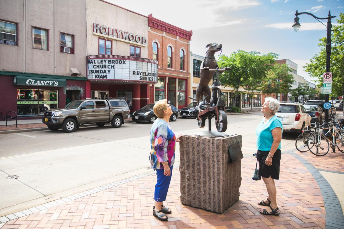 Two senior women exploring the Eau Claire Sculpture Tour