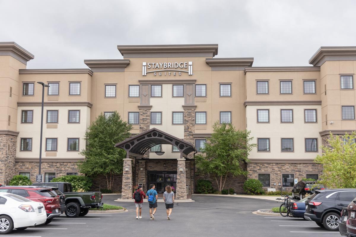 A group of guys walking into Staybridge Suites in River Prairie in Altoona, WI