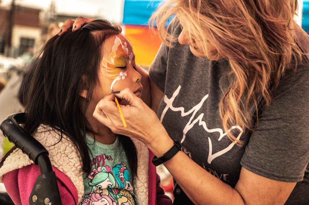 Face painting at River Prairie Festival