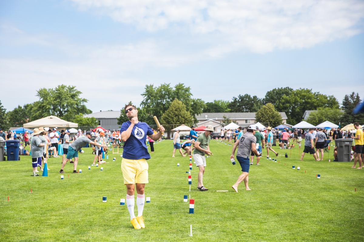 People and teams playing on the field at the US Kubb Championships