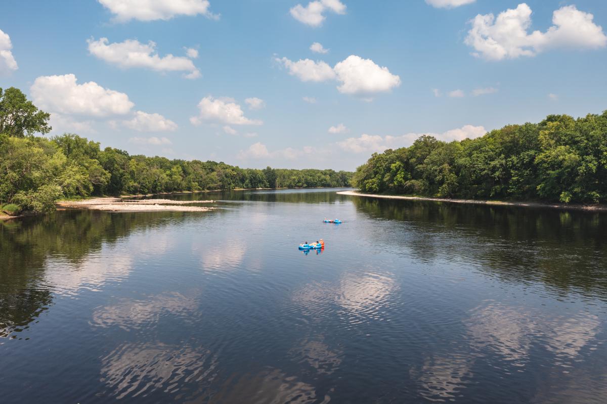 3 girls tubing on the Chippewa River at Loopy's