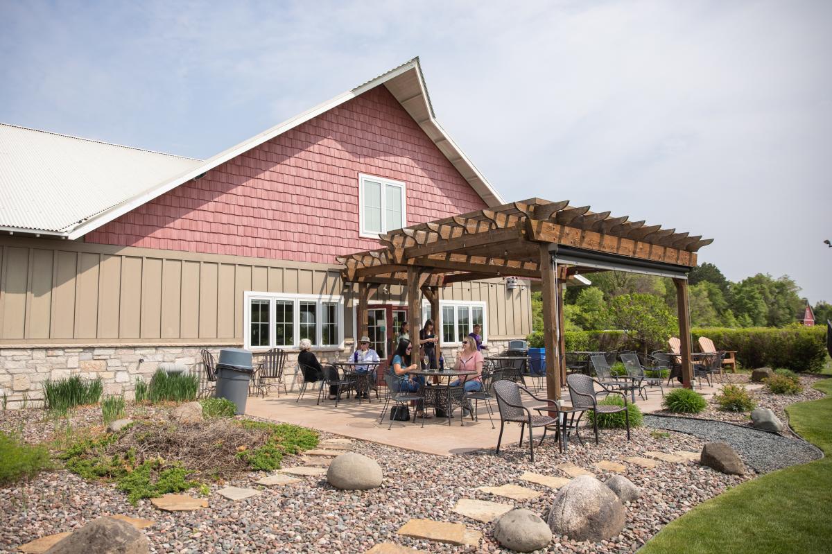 The outdoor patio at Riverbend Winery & Distillery in the Town of Wheaton
