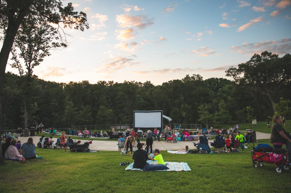 The crowd at an outdoor movie night at River Prairie