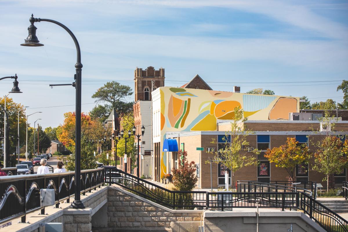 Colorful mural painted on the side of Token (view from Grand Ave. bridge)