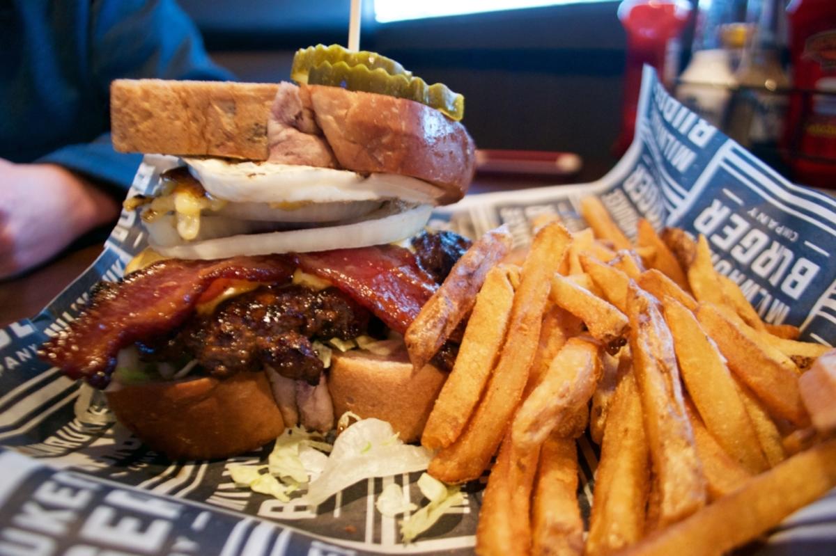 The Blueberry Hangover burger served with fries at Milwaukee Burger