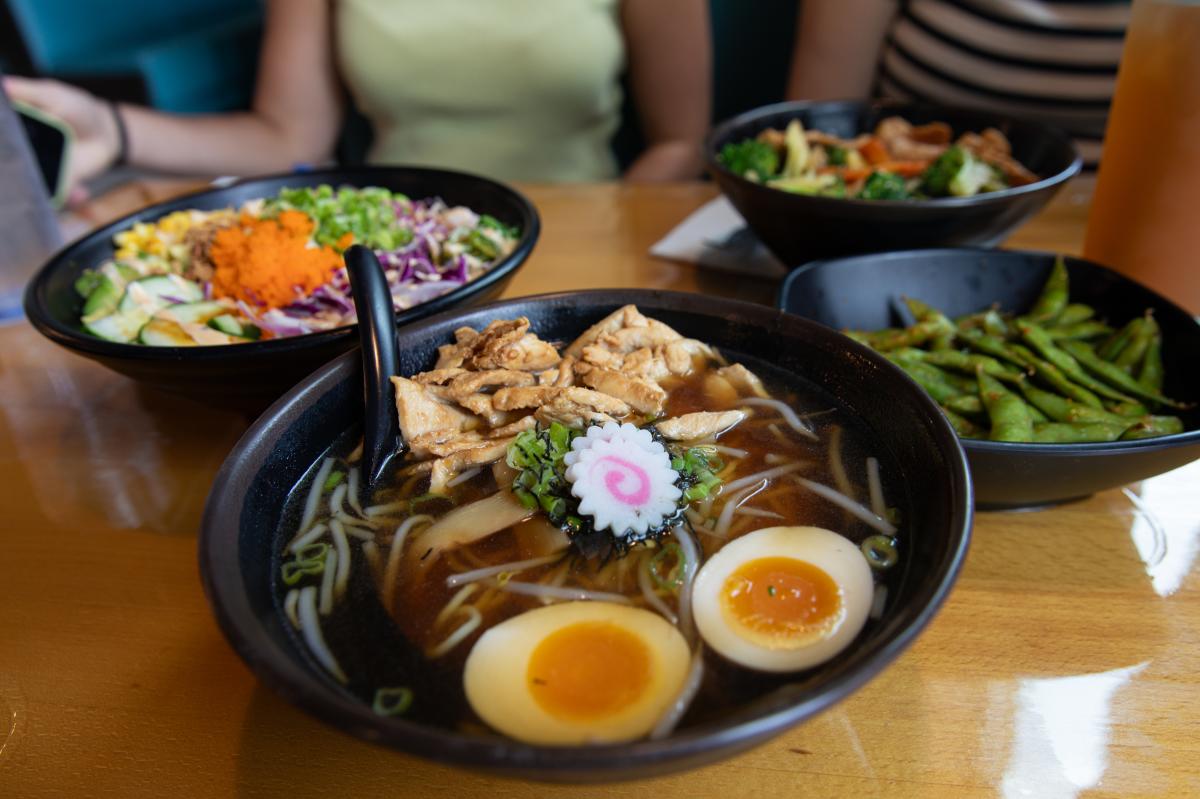 A spread of ramen and rice bowls at Madden Ramen