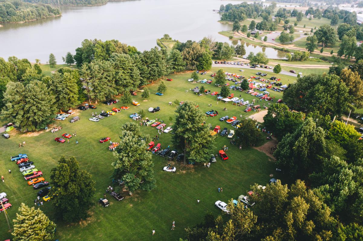 an aerial shot of freeman lake park during the car show of cruisin the heartland