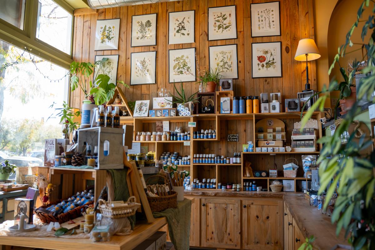 Inside a store with various bottles of oils and lotions