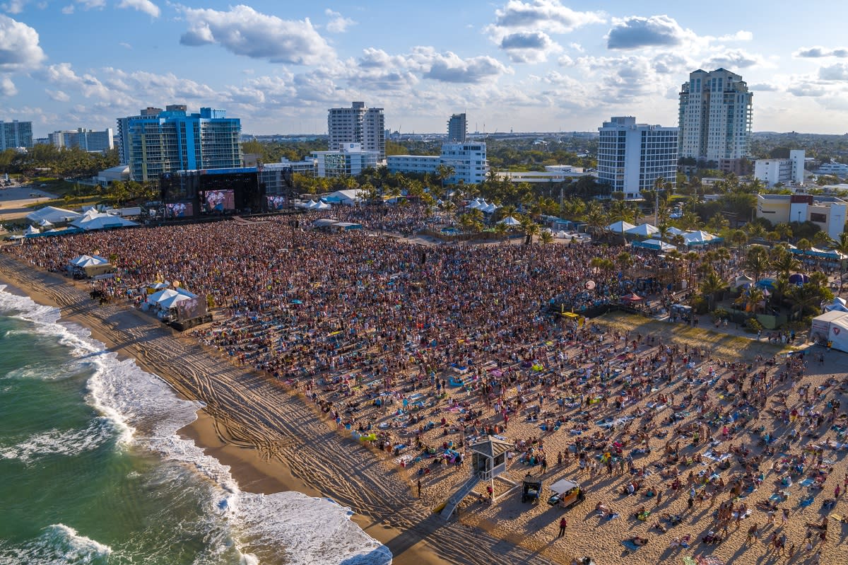 Aerial view of crowd at Tortuga Music Festival on Fort Lauderdale Beach taken looking southwest from the Atlantic Ocean
