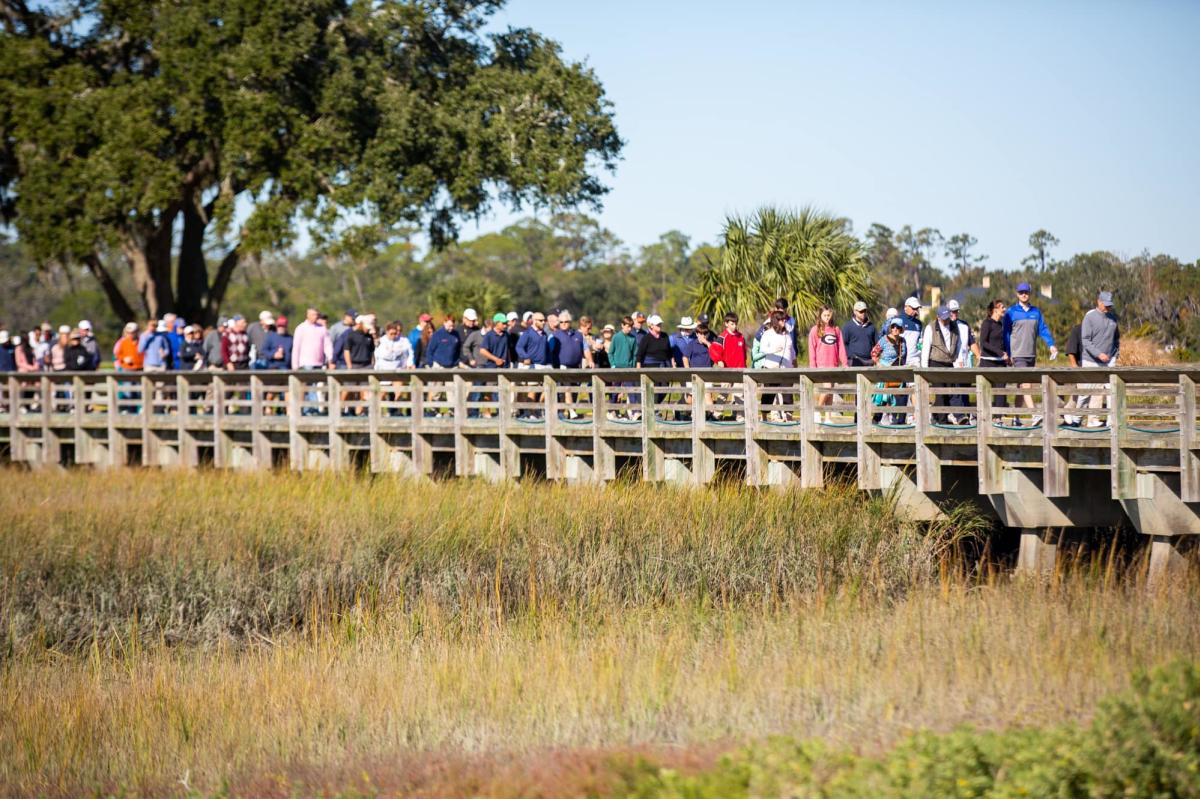 Spectators enjoy walking the beautiful grounds of the Sea Island Golf Club during the RSM Classic.