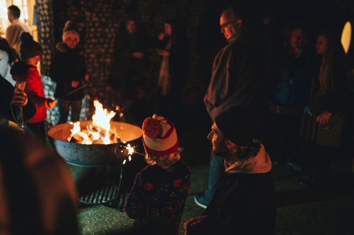 Child toasting marshmallows, The Kennels