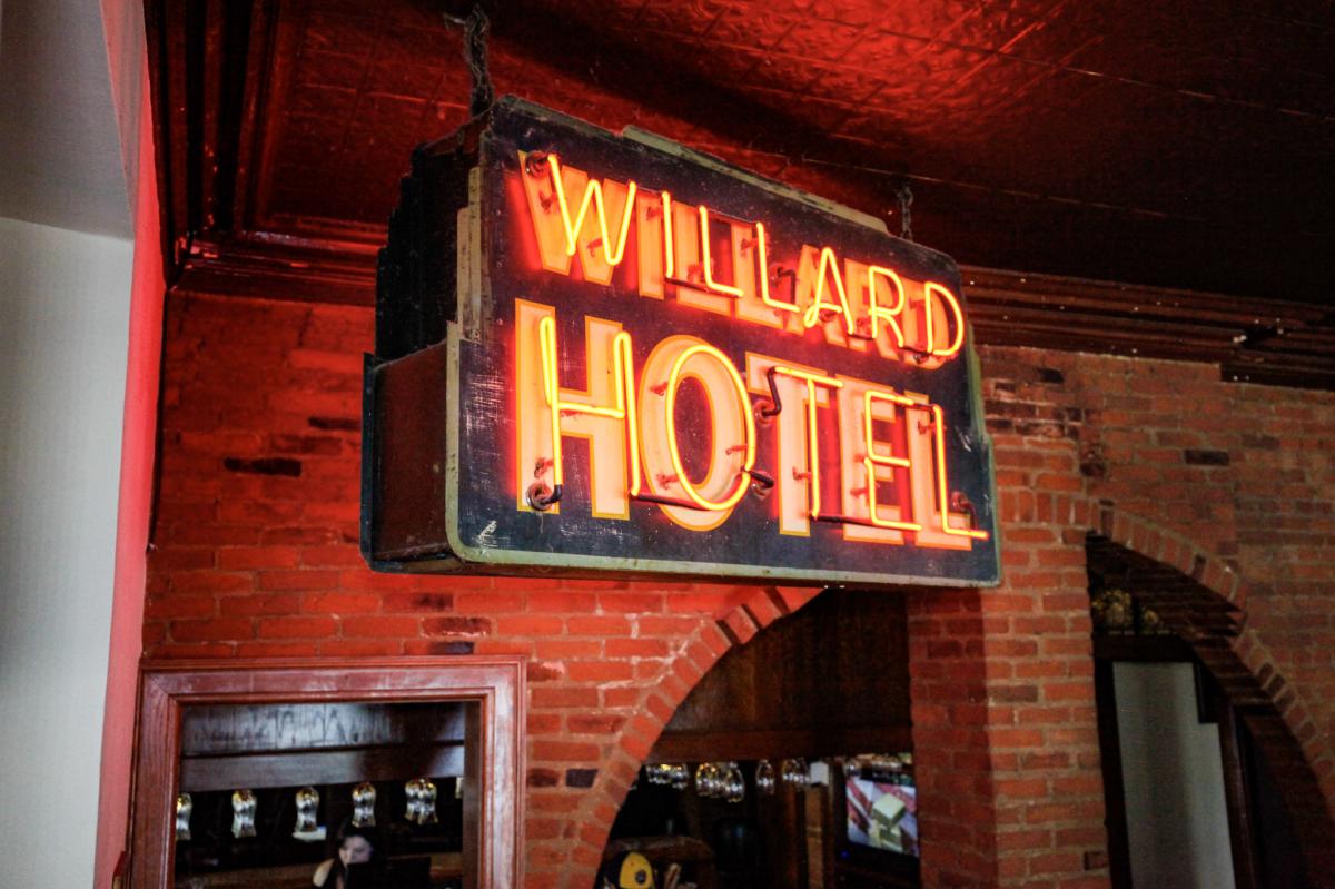 A neon sign of The Willard Hotel in Franklin Festival Country