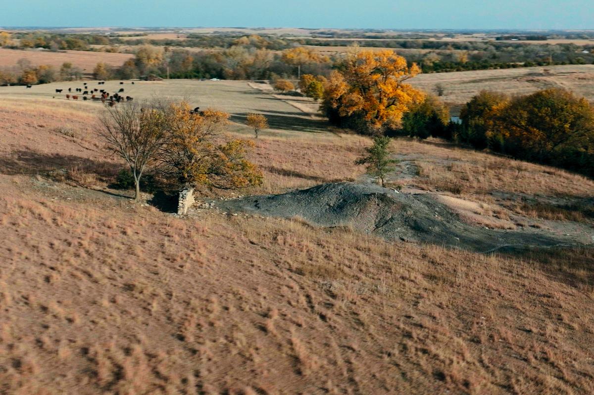 an aerial view of a landscape, it shows the remains of a mine.