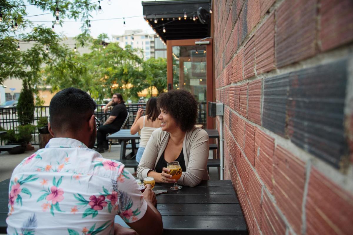 People drinking beer outside at BNA Brewing Co.