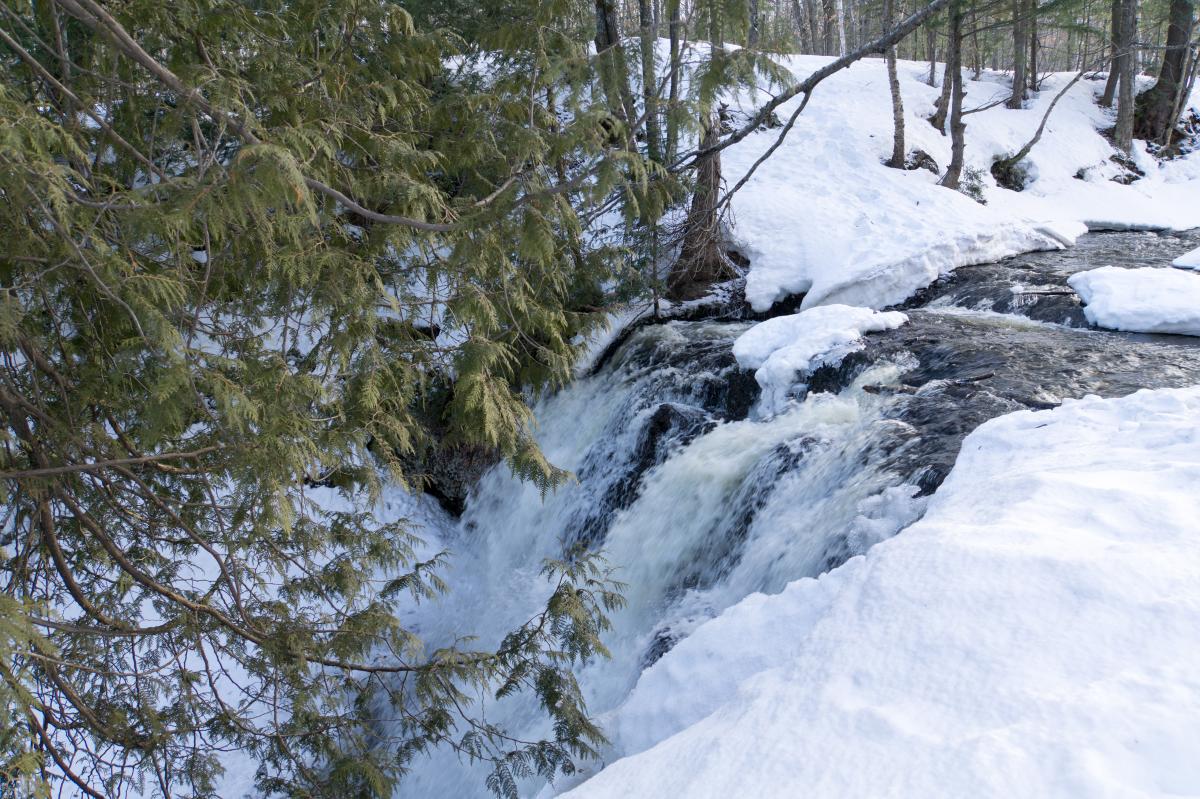 Upper Hungarian Falls from top down view with snow and water