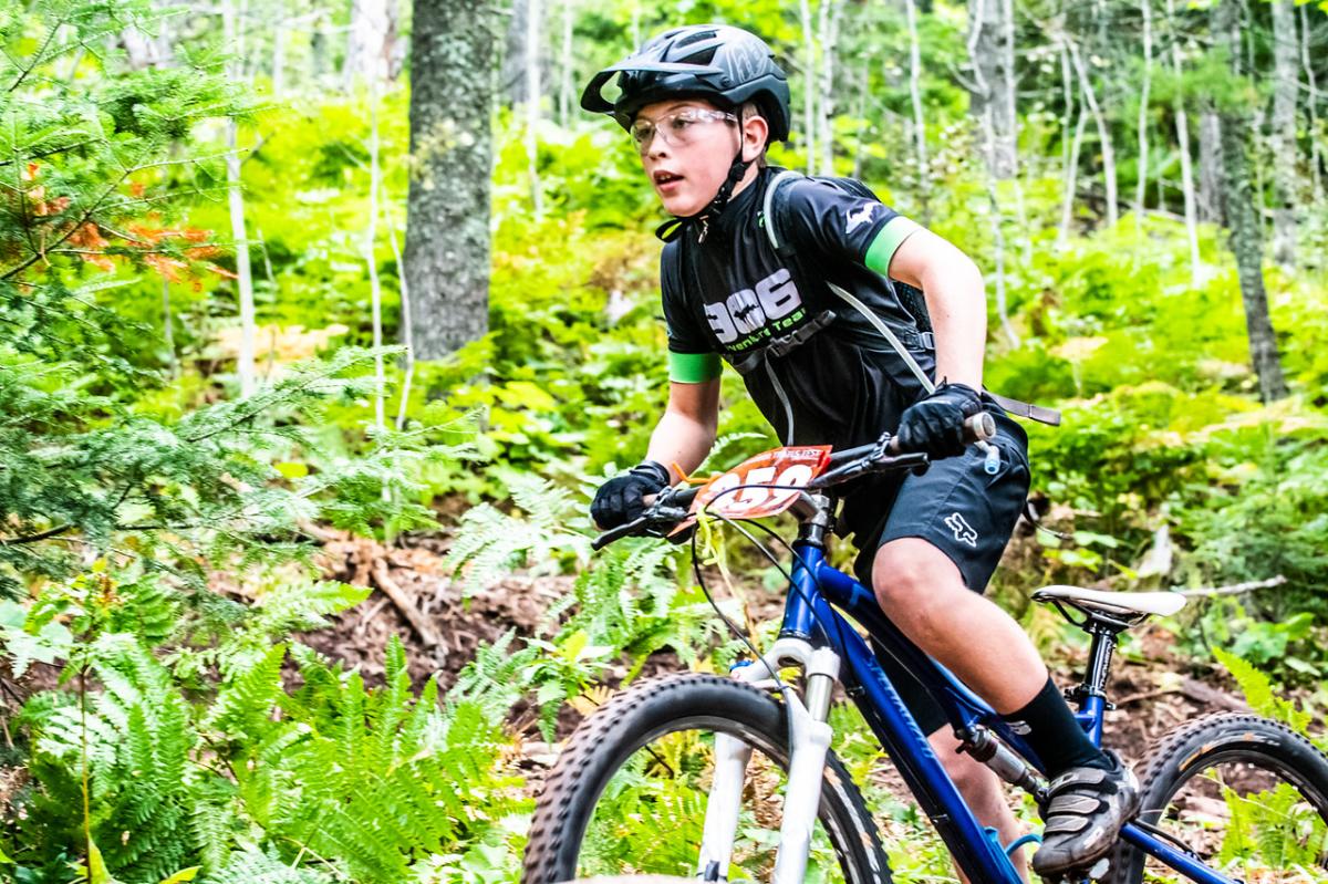 Young  boy participating in mountain biking race