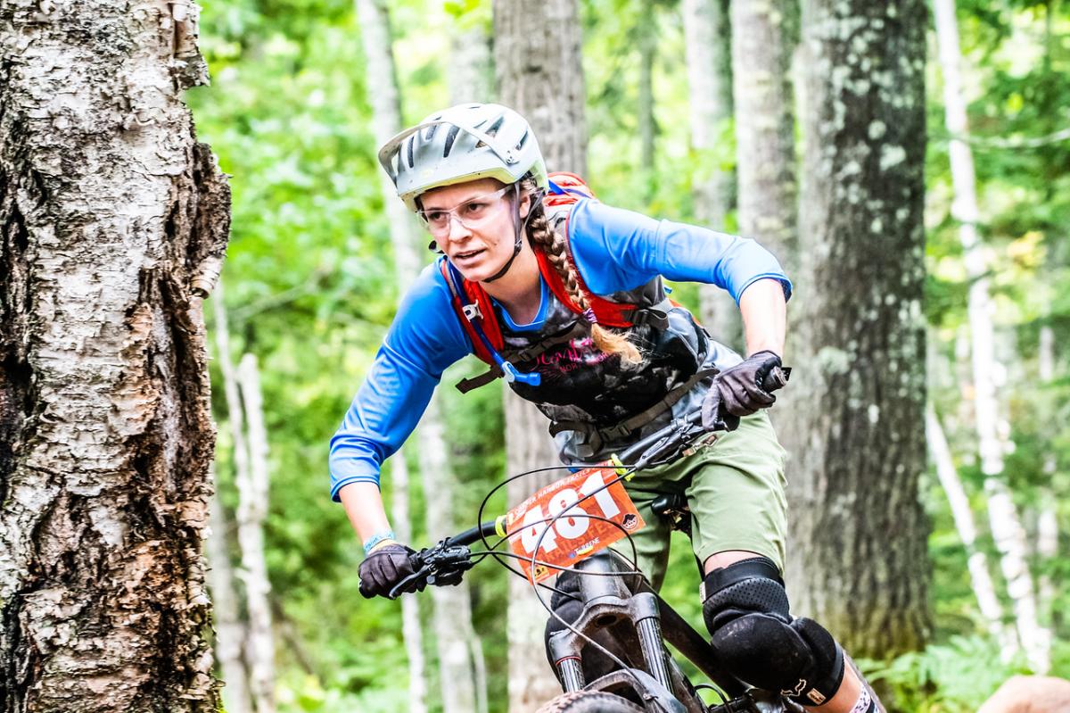 Woman participating in Trails Fest race