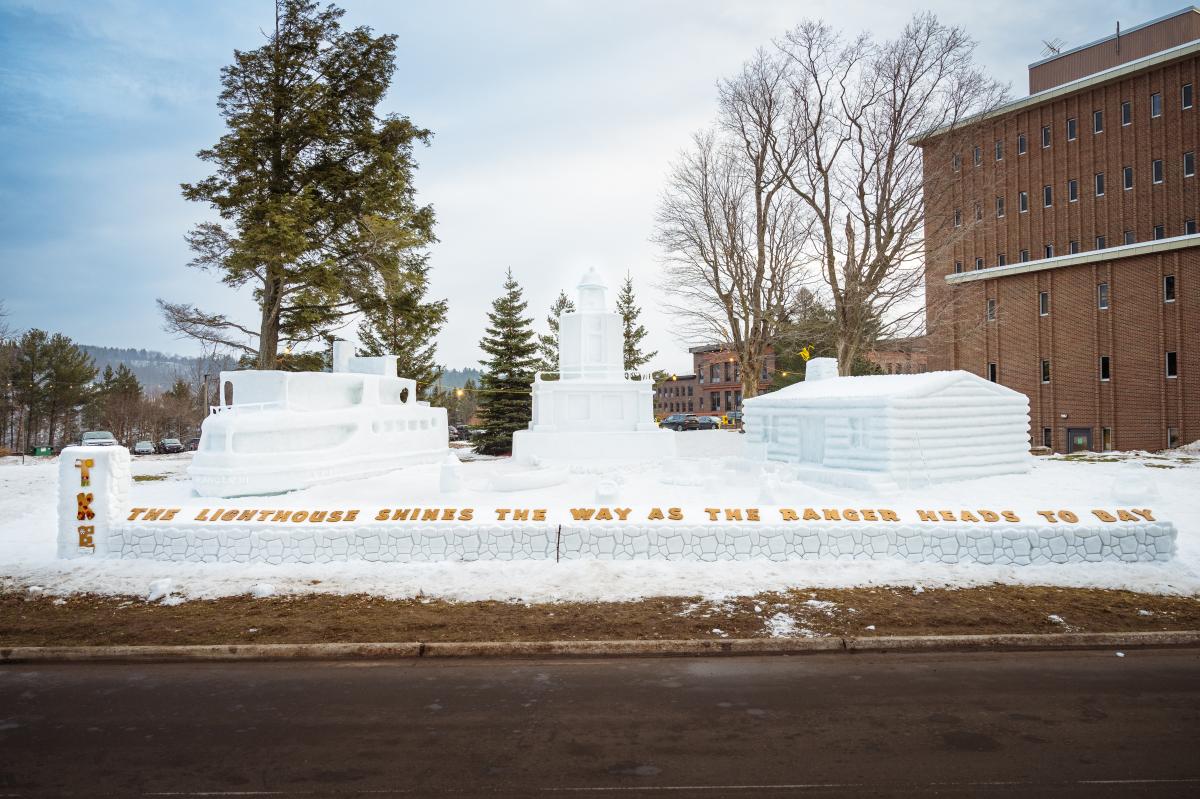 “The Lighthouse Shines the Way as the Ranger Heads to Bay” (Michigan Tech)