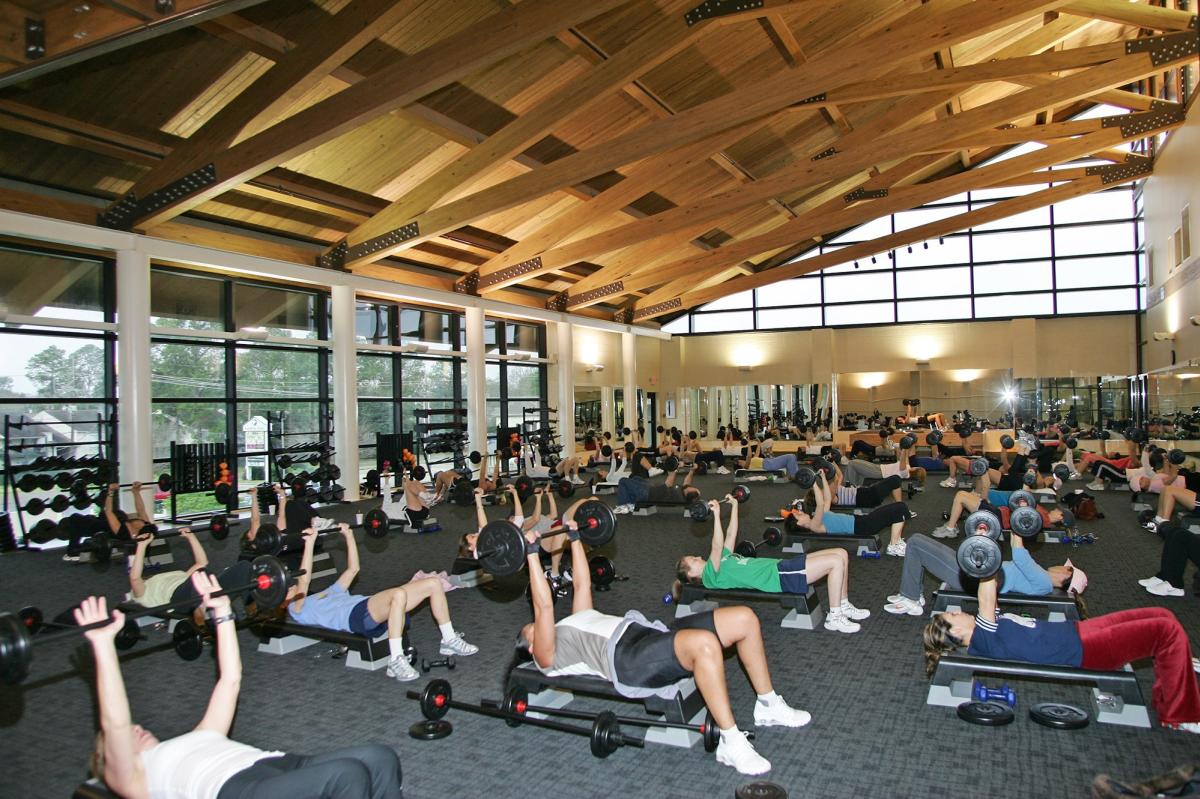 Weightlifters bench pressing at Red Lerille's Health and Racquet Club