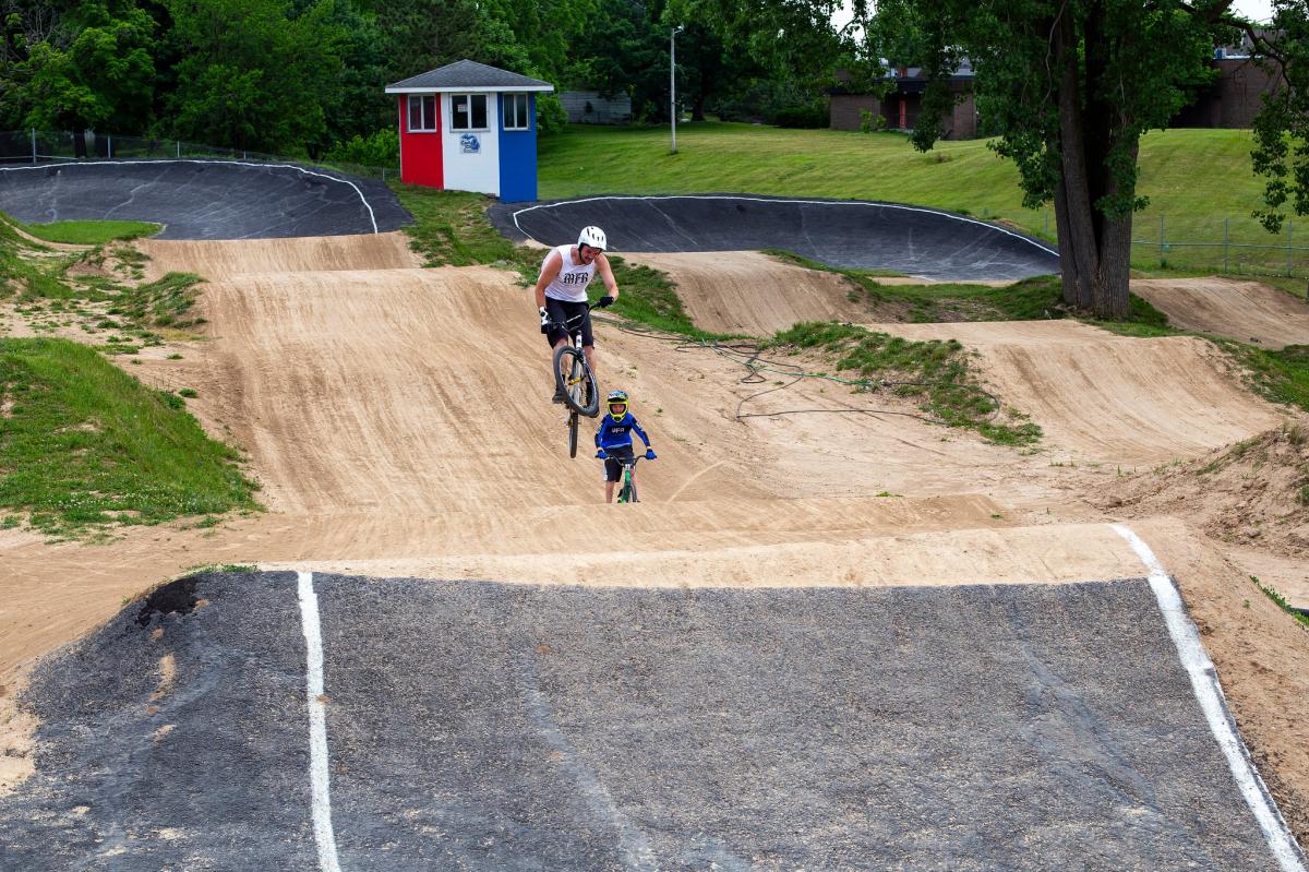 Person doing a jump on the Capital City Family BMX Track