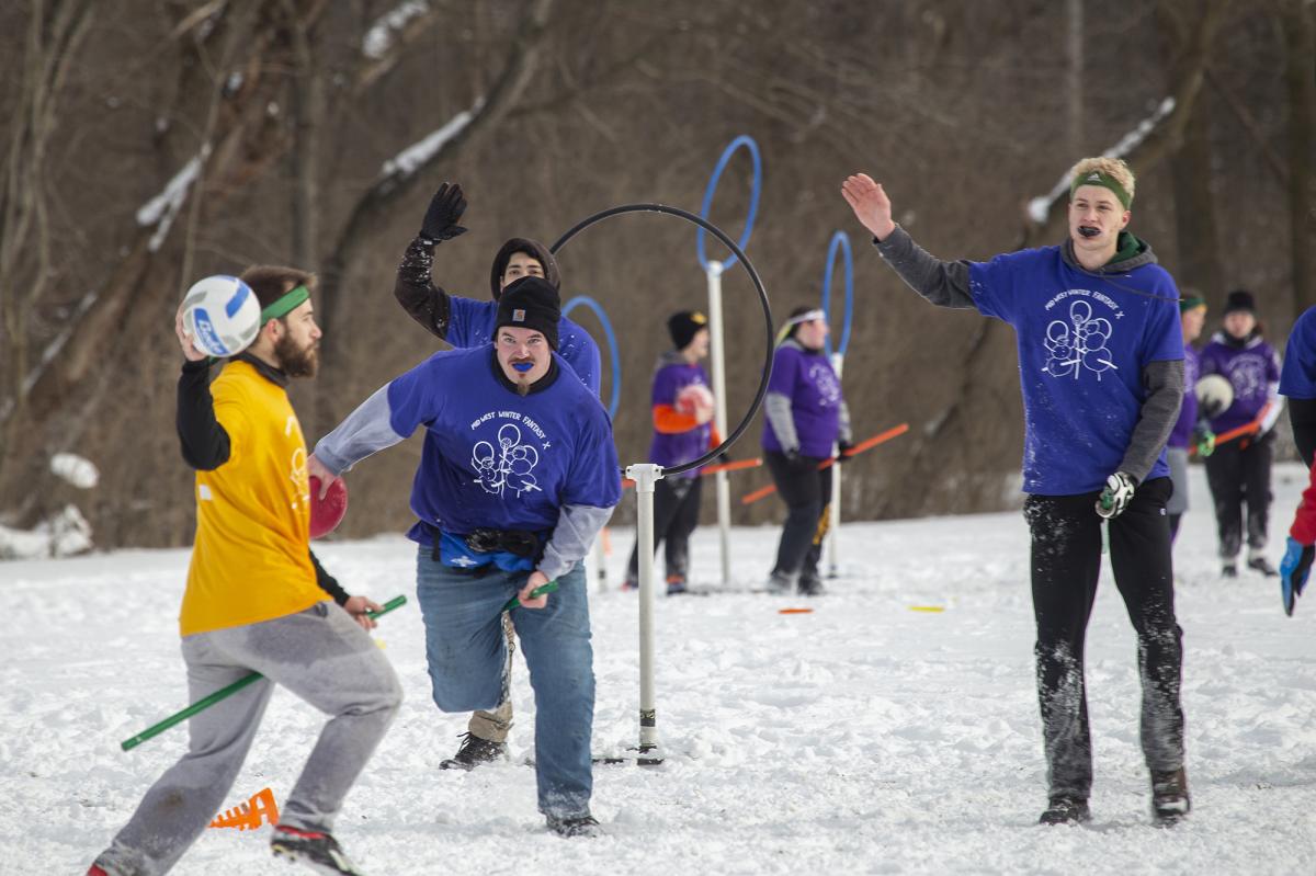 Group pf people playing Quadball/Quidditch