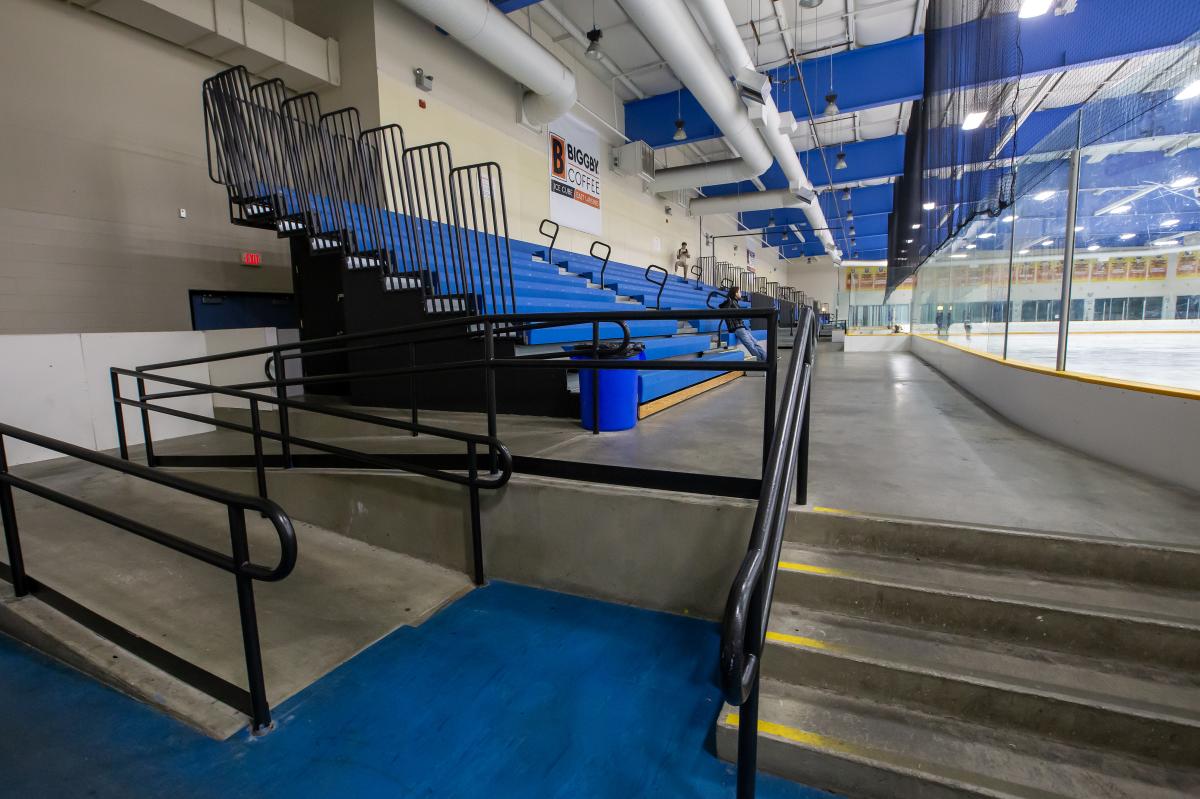 Bleachers with accessibility ramp at Biggby Coffee Ice Cube East Lansing Skate Rink 1