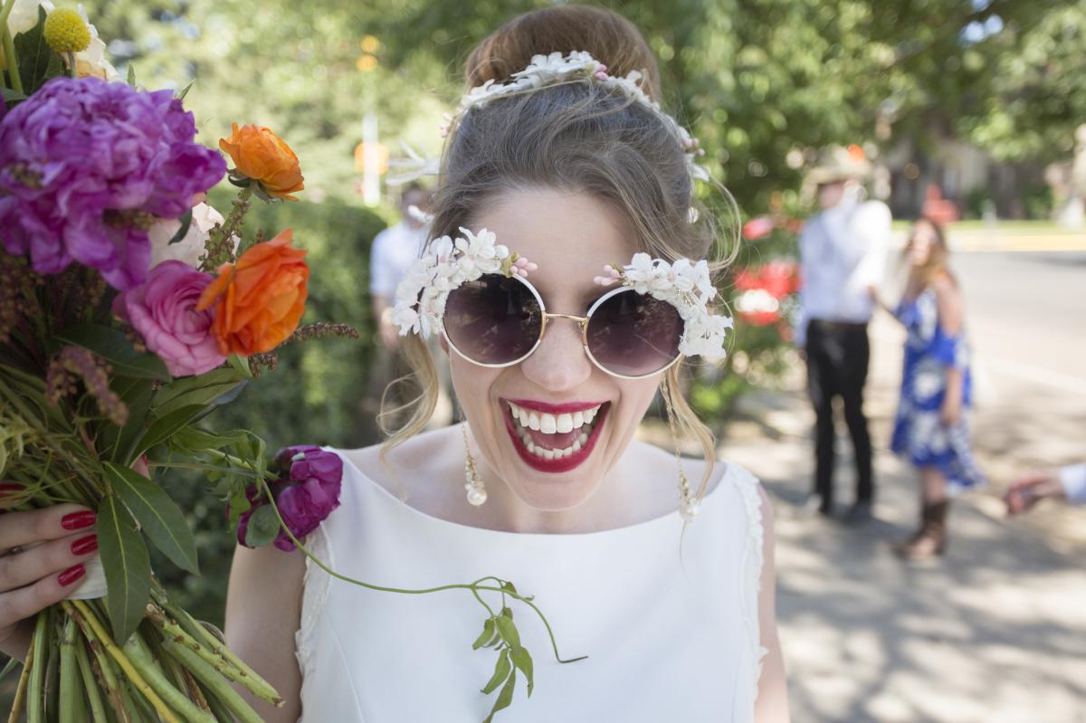Ecstatic bride in Laramie, Wyoming outdoor wedding elopement