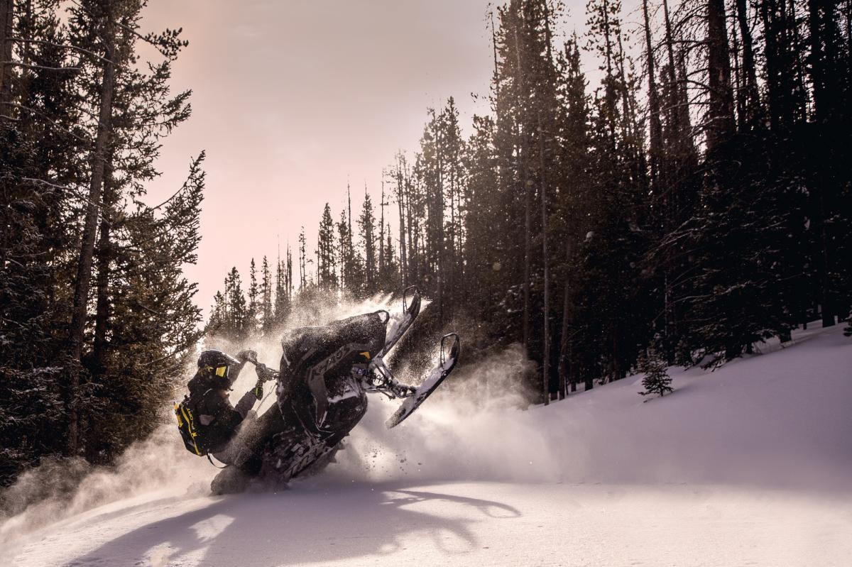 Snowmobiling Snowy Range Action Shot