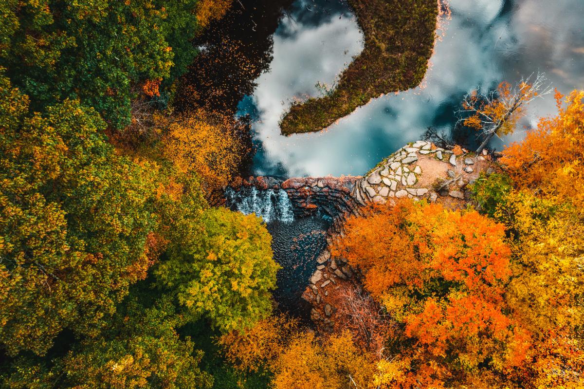 Jones Mill Run Dam features stunning fall foliage in the Laurel Highlands.