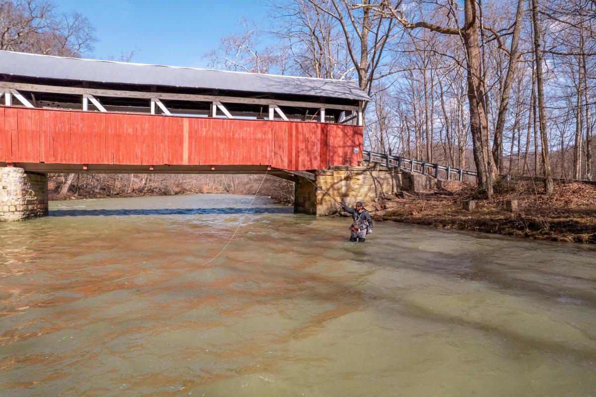 Andy Davis of Spooled Guide Services in Mount Pleasant fishes at Lower Humbert Bridge in Lower Turkeyfoot Township.