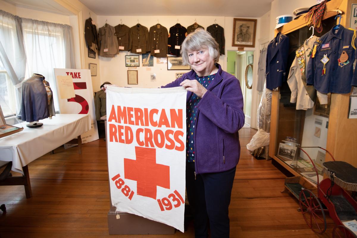 Woman with Banner at Dansville Museum