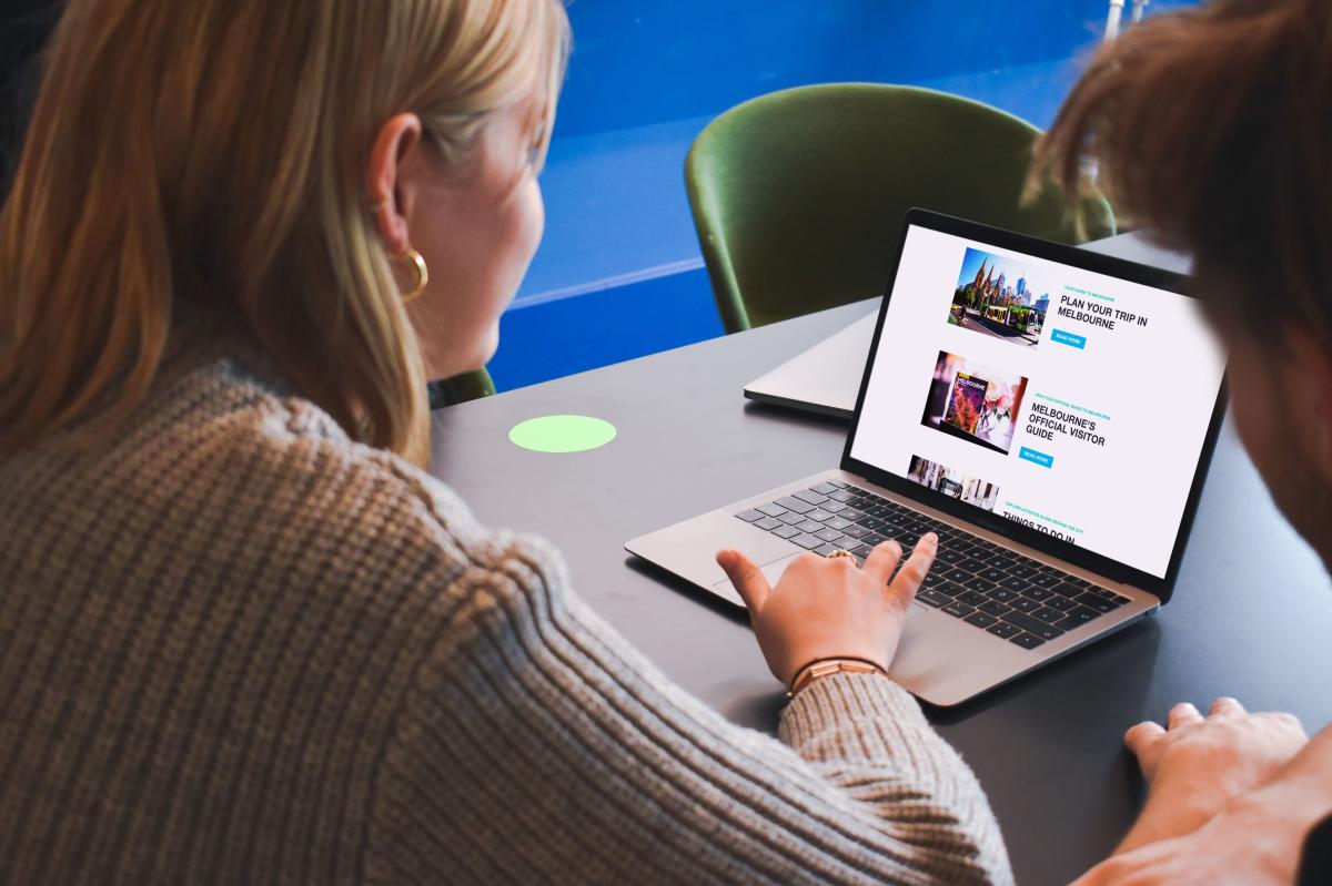 Woman looking at laptop screen