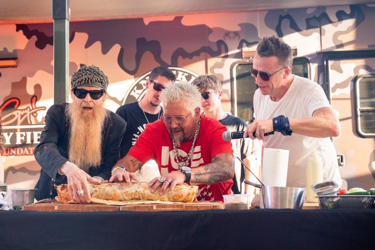 Guy Fieri and guests cook up some barbecue during Stagecoach