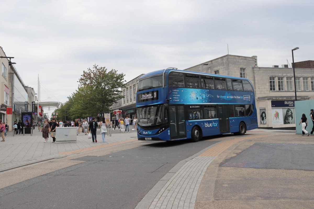 Bluestar Bus driving on Hanover Buildings Street