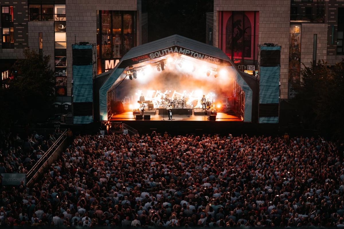 Thousands of people gathered in front of Southampton Summer Sessions stage at Guildhall Square at night