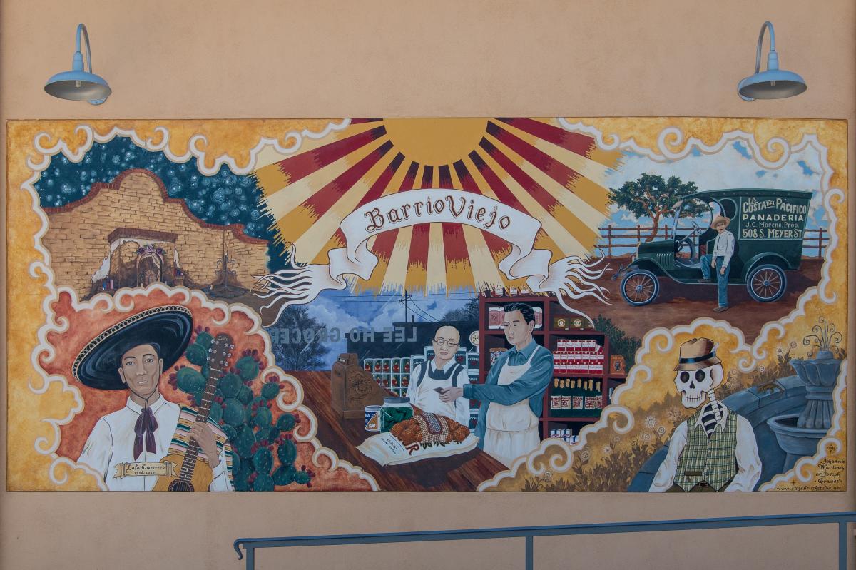 Mural in Barrio Viejo depicting images and icons from the neighborhood's history.