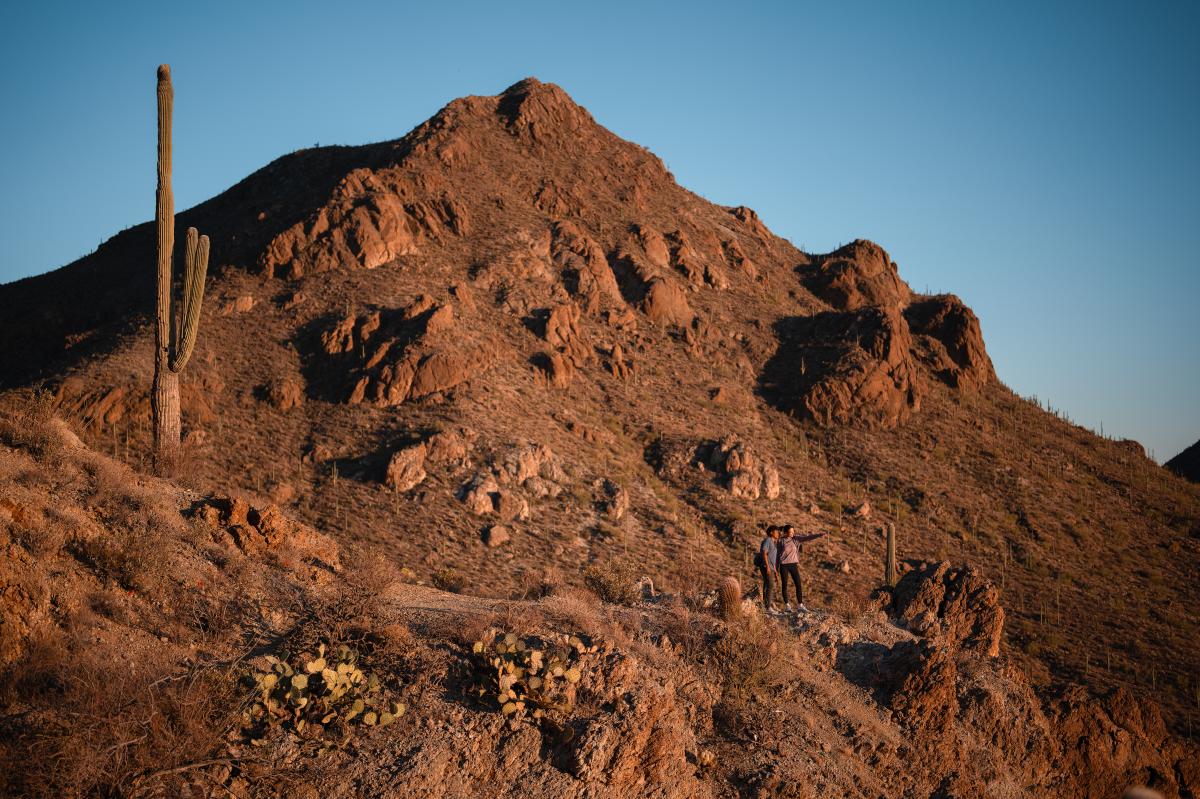 two people standing at an overlook at Gate's Pass in Tucson Mountain Park