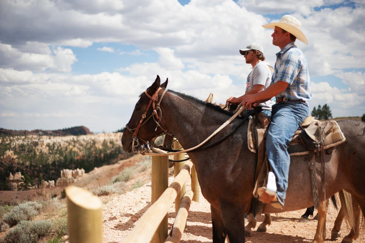 Two men on horses near Bryce Canyon