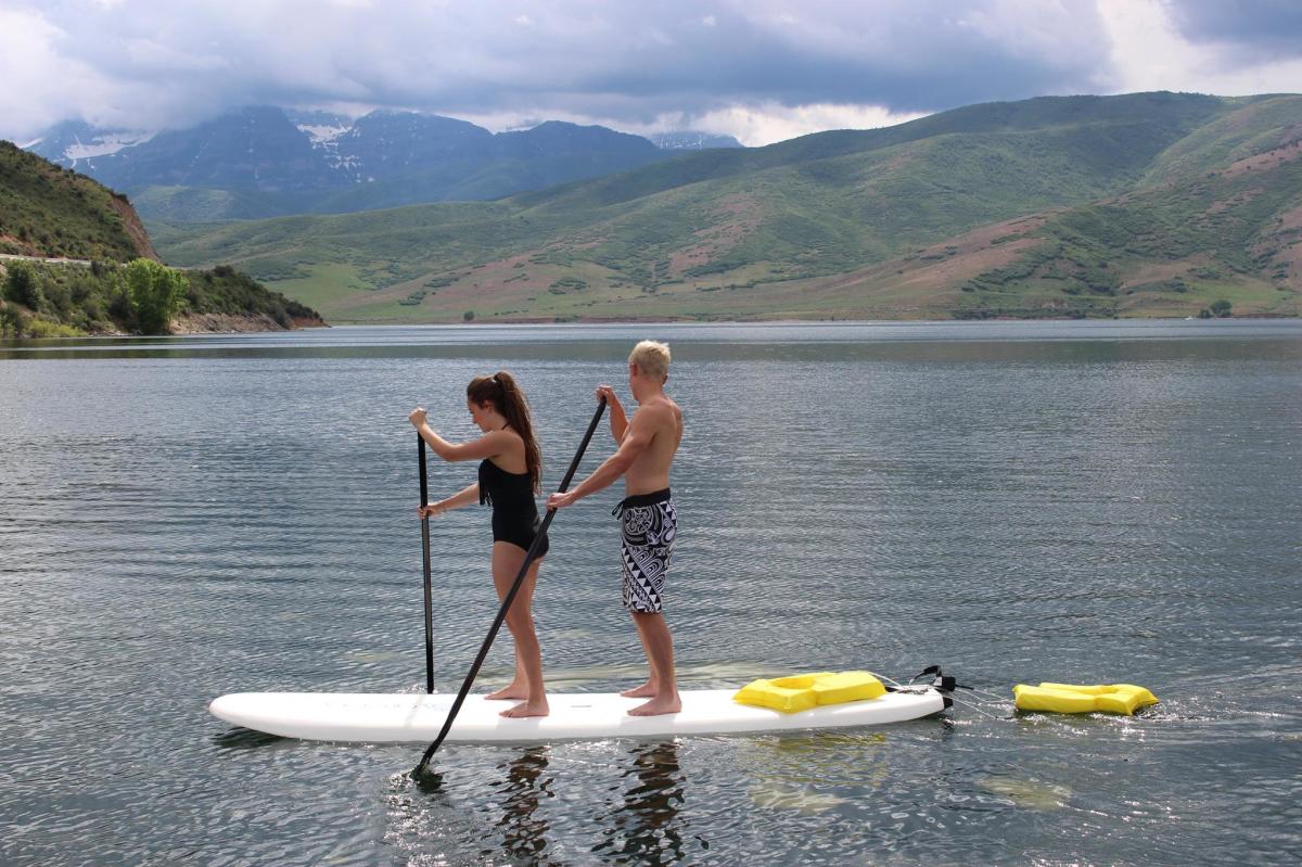 Man and Woman on StandUp Paddleboard SUP