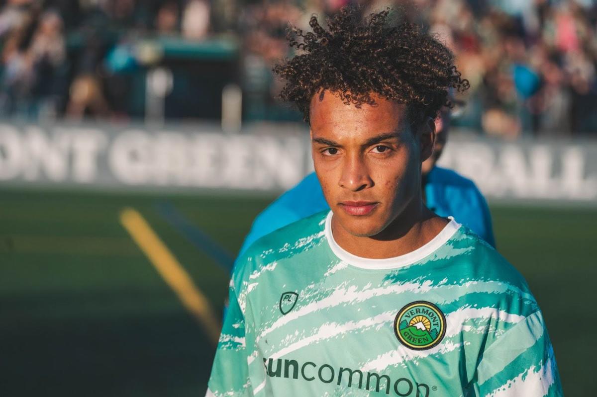 Zach Zengue, player for the Vermont Green FC wearing a jersey.