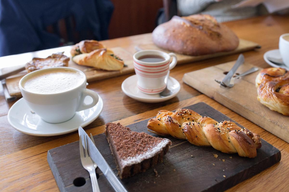 Richmond's Sub Rosa Bakery in located in Church Hill. A table with pie, coffee, and baked goods