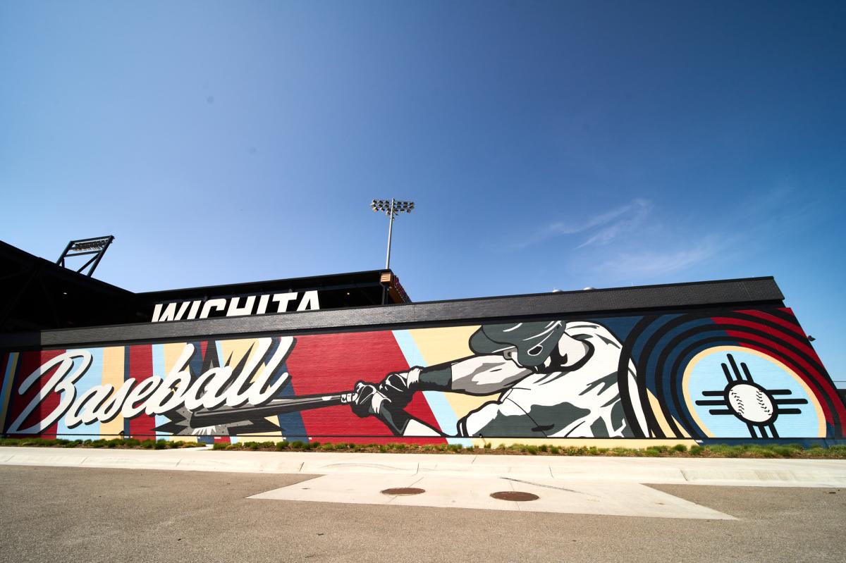 A photo of the baseball mural outside of Riverfront Stadium is taken by Darrin Hackney