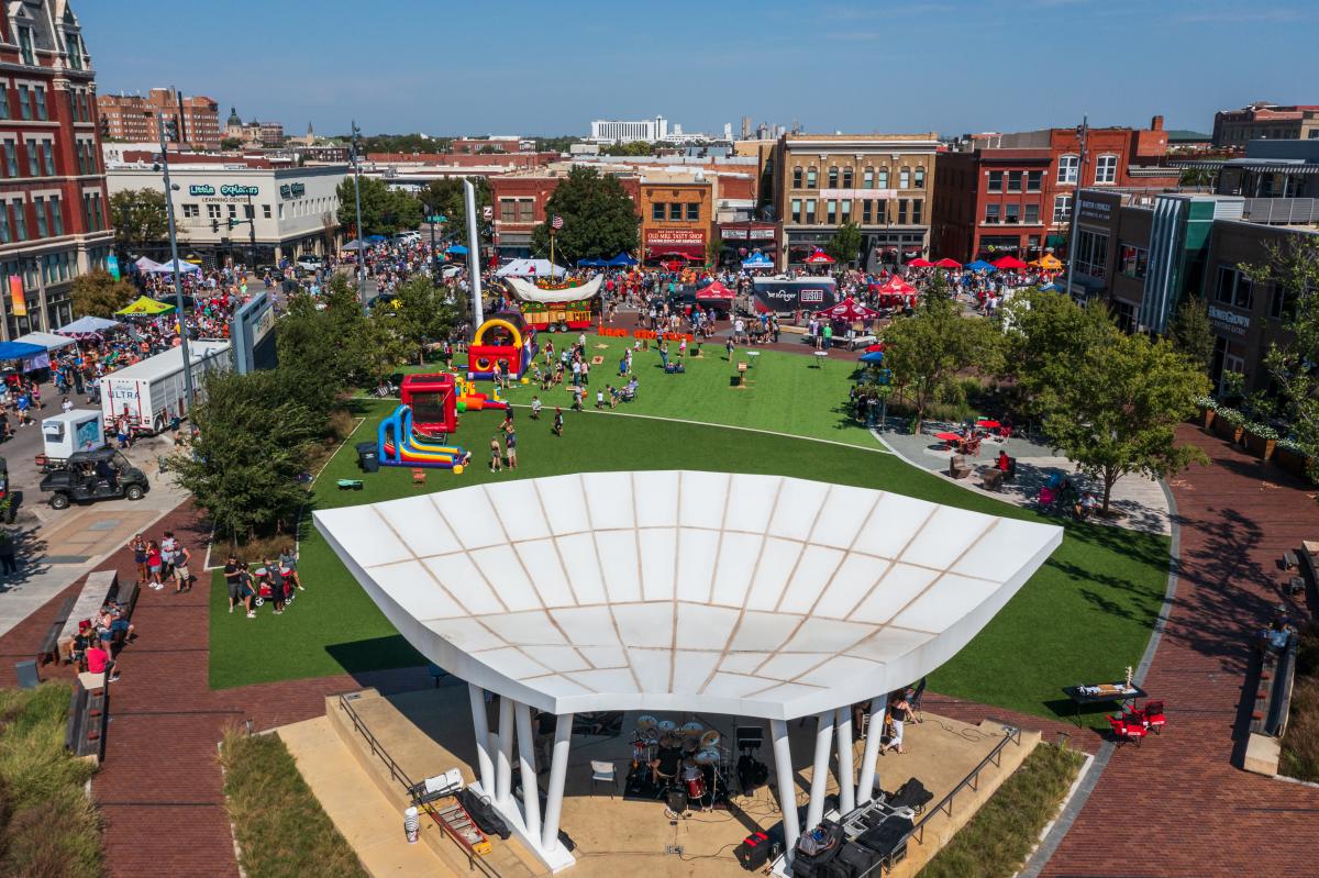Crowds gather on Douglas Ave. in front of Naftzger Park to take part in the annual Wagonmasters Downtown Chili Cookoff