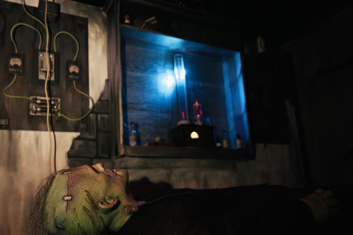 A monster prop lies in wait of visitors at 13 Sinister Souls haunted attraction