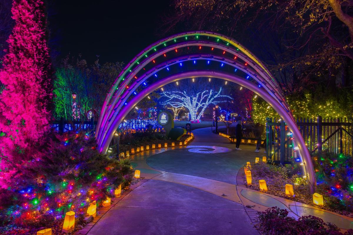 Lights illuminate the rainbow arch in the Children's Garden at Botanica Wichita