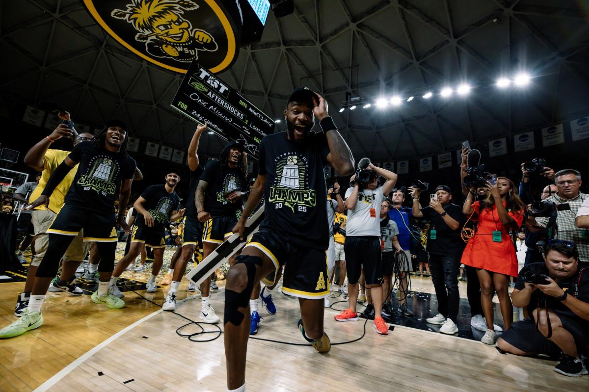 A player for the AfterShocks celebrates after they win the 2025 TBT Final at Charles Koch Arena