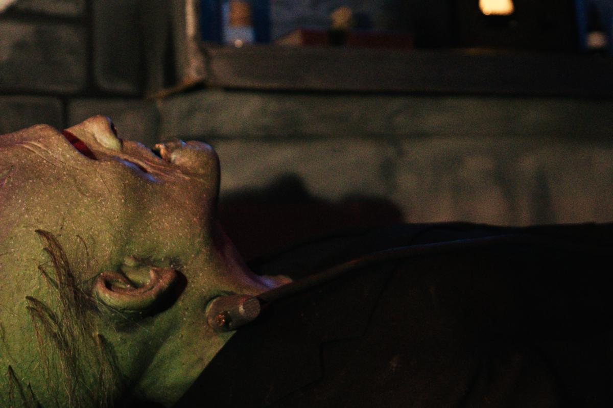 A monster prop lies in wait of visitors at 13 Sinister Souls haunted attraction