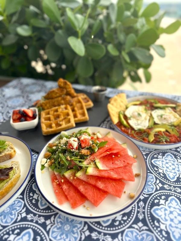 Watermelon carpaccio and waffles with fruit