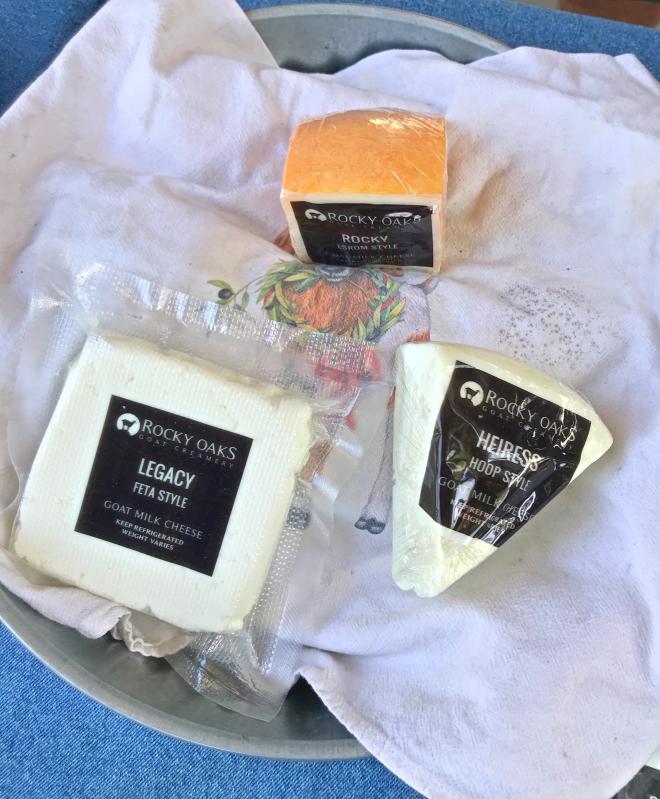 different goat cheese flavors at farmers market