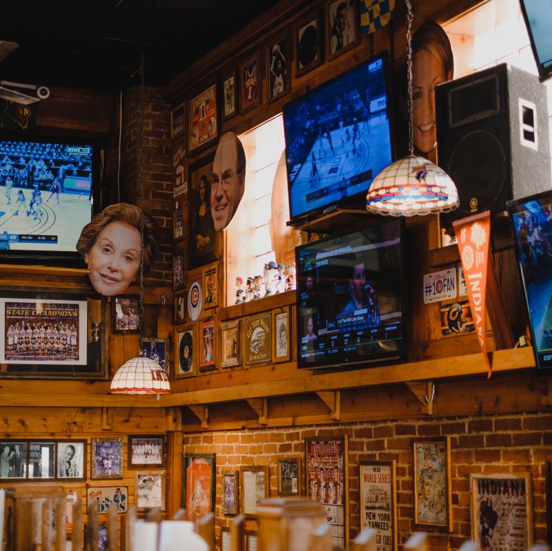 Walls lined with TVs and sports memorabilia at BuffaLouie's